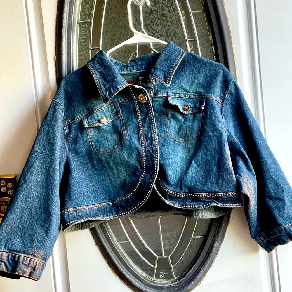 There is no faded areas it’s the sun shining in on it. Denim & Rhinestones 3x